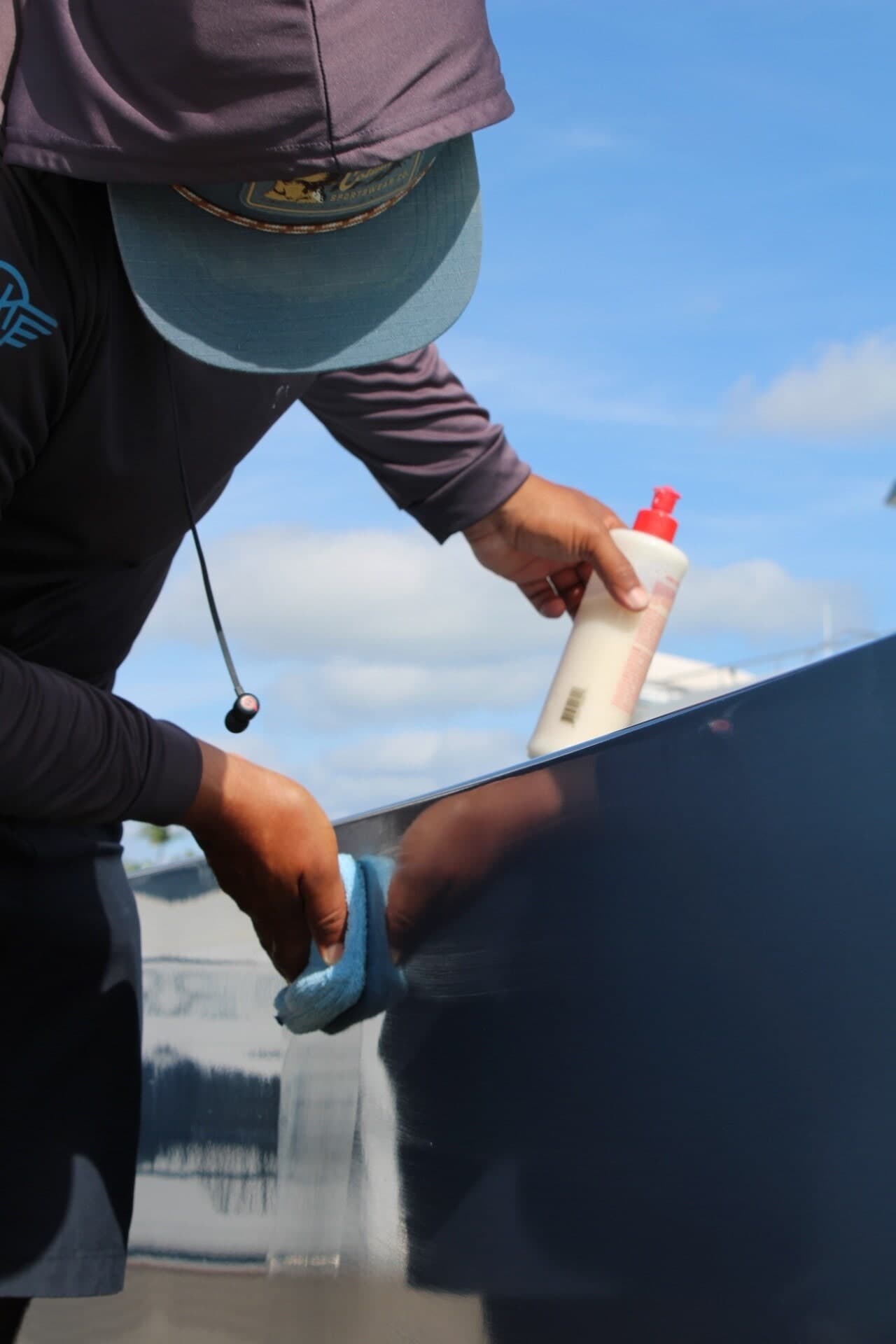 Close-up of finished boat gelcoat surface showing deep reflective shine